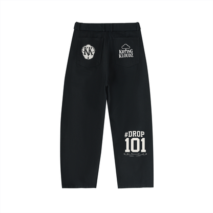 Twisted-Seam Belted Curved-Blade Pants